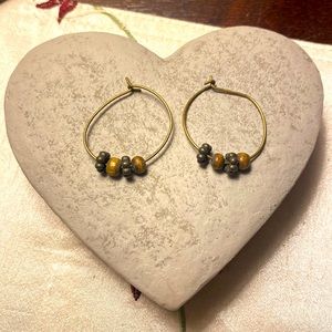 Hoop earring set.  Copper wire loops with black and brown beads.